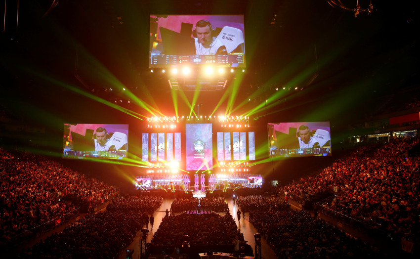 Fans of Electronic Sports (E-Sports) watch the final of the ESL One Cologne Counter-Strike tournament at the Lanxess Arena in Cologne, Germany July 8, 2018. REUTERS/Wolfgang Rattay